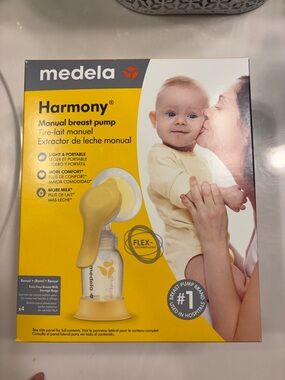 Medela Harmony Manual Breast Pump in Yellow and White